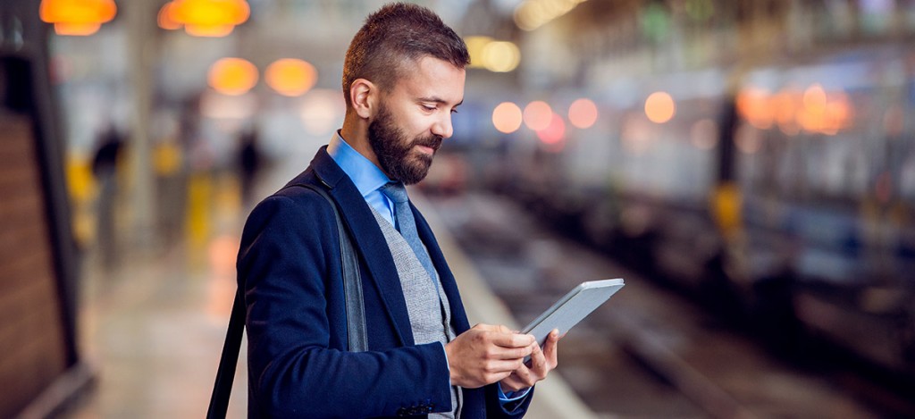 Commuter using tablet